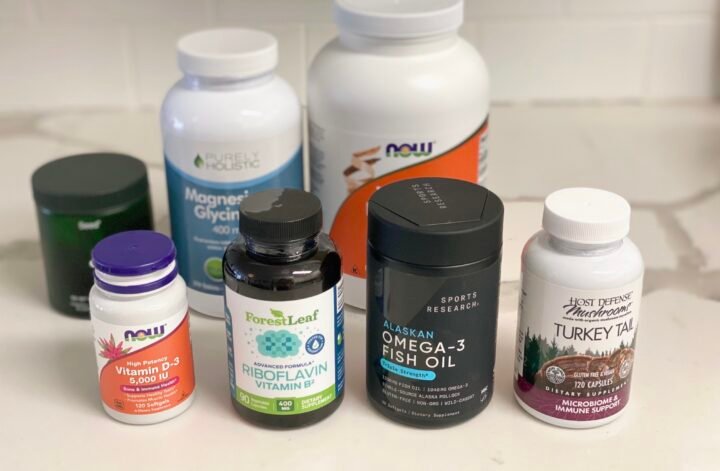 My daily supplements bottles are laid out on the kitchen counter